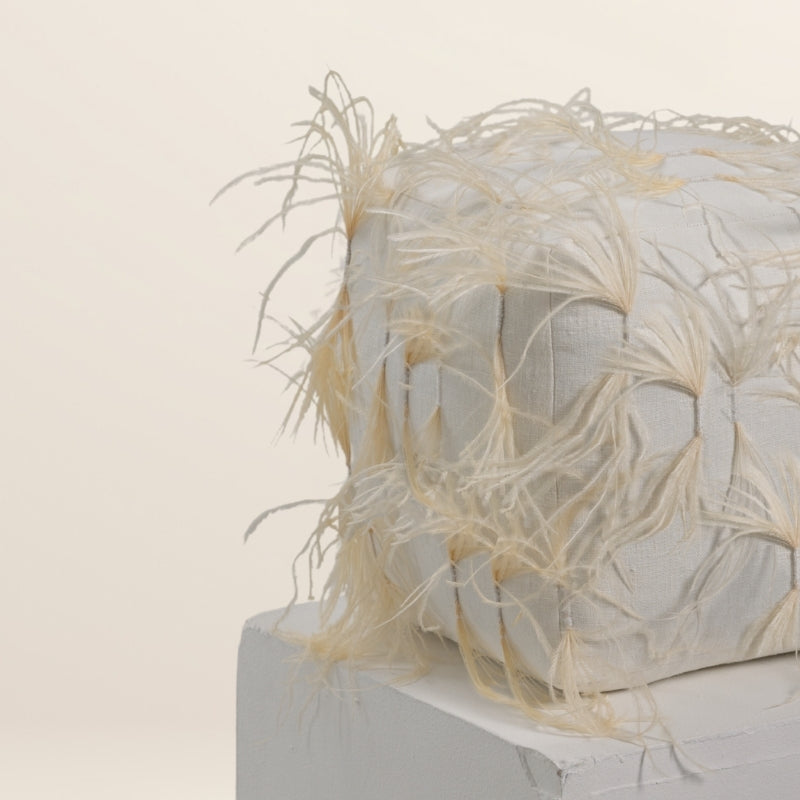 The CUBE scatter in feathers