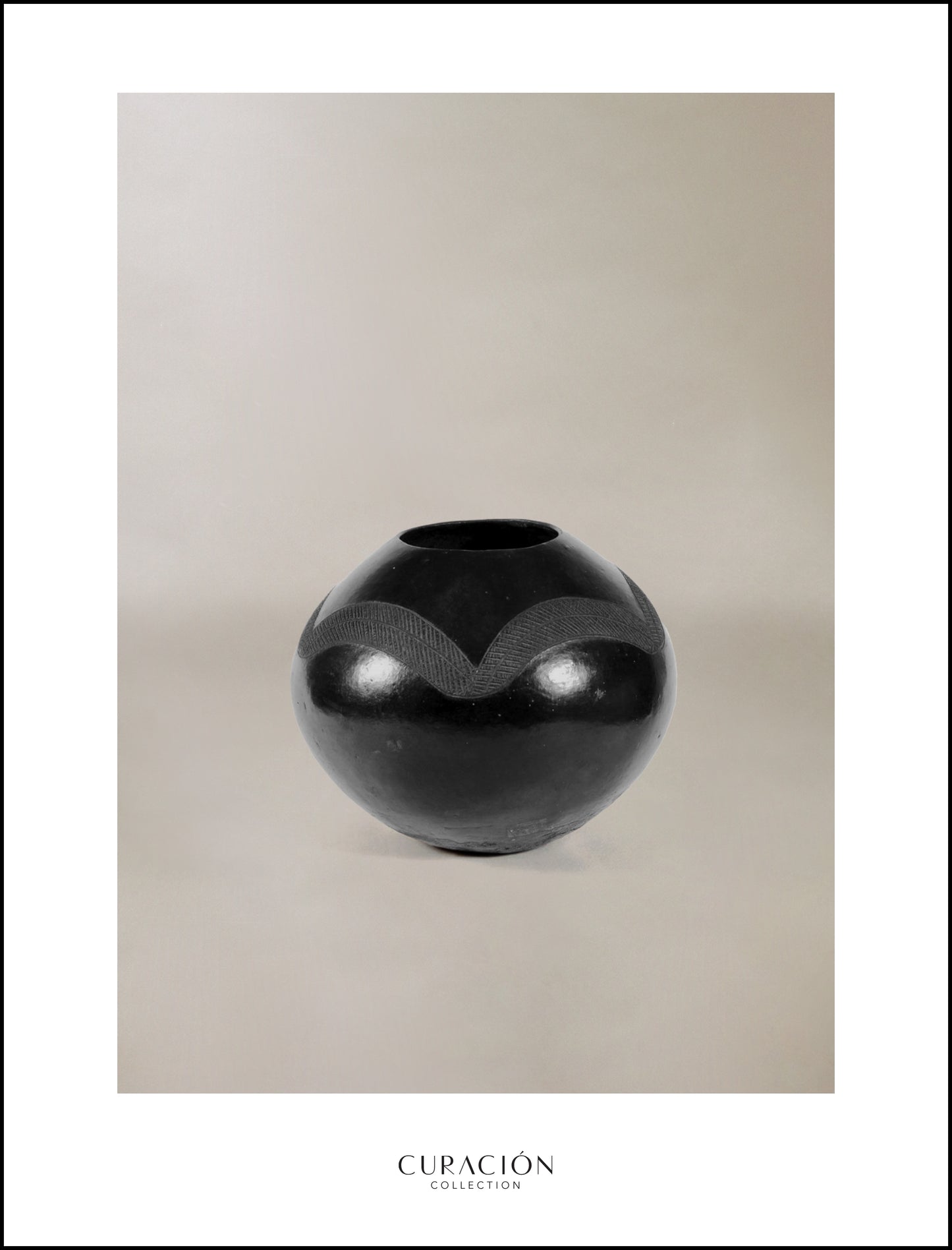 A SMALL zulu pot