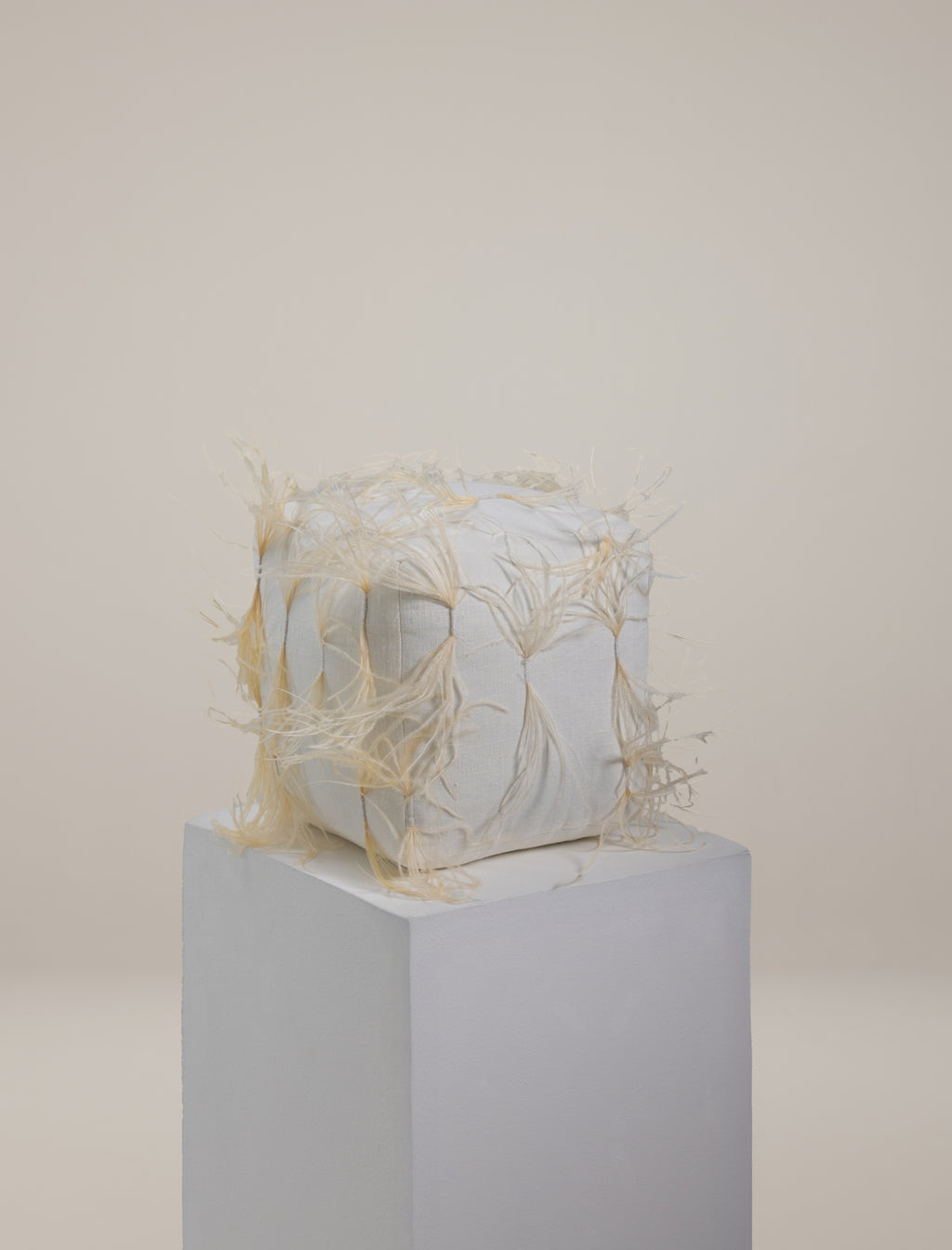 The CUBE scatter in feathers
