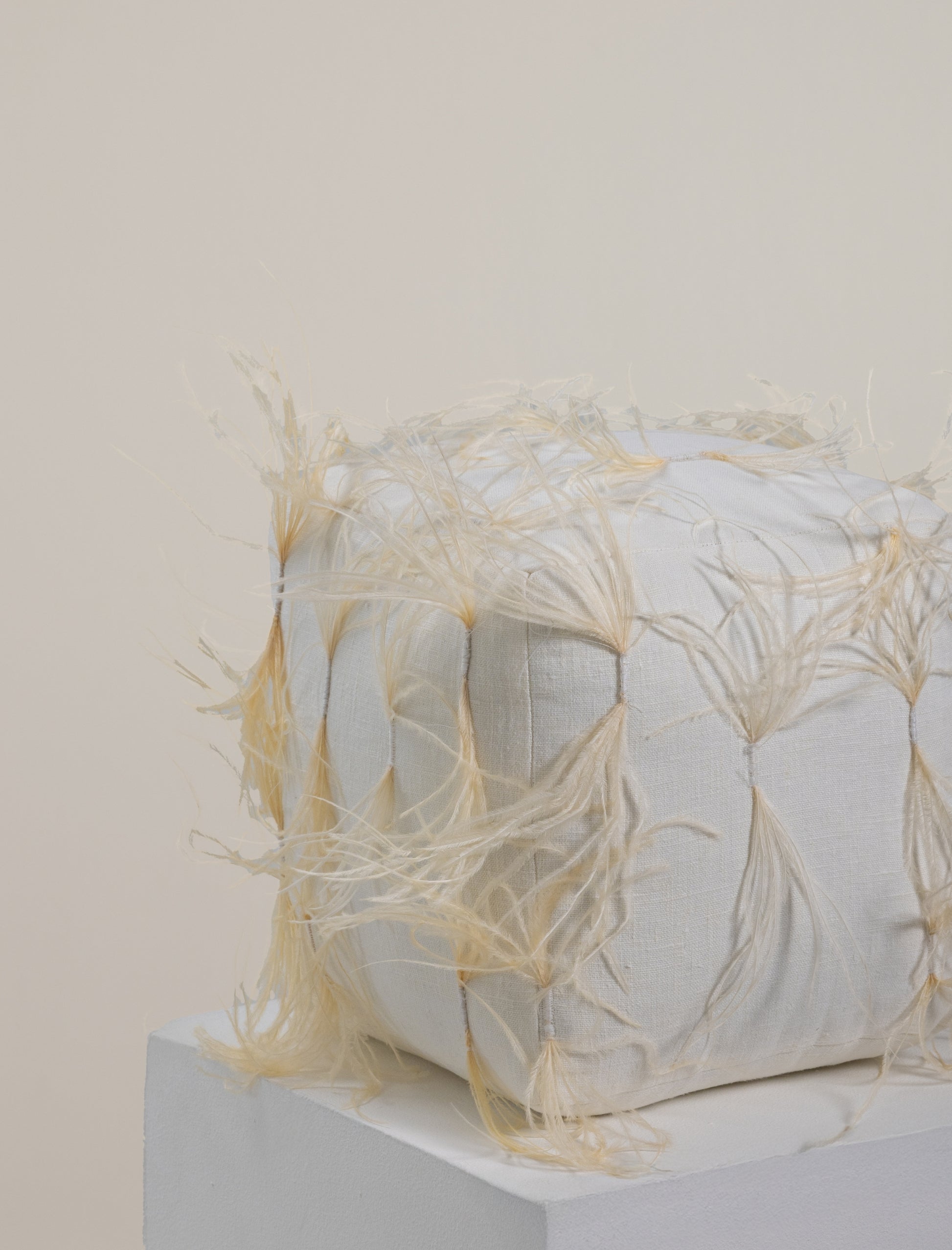 The CUBE scatter in feathers