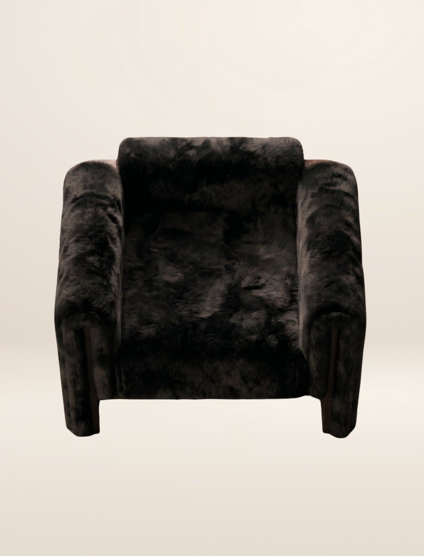 The SOCIALÉ occasional chair, in char shearling on chocolate wood