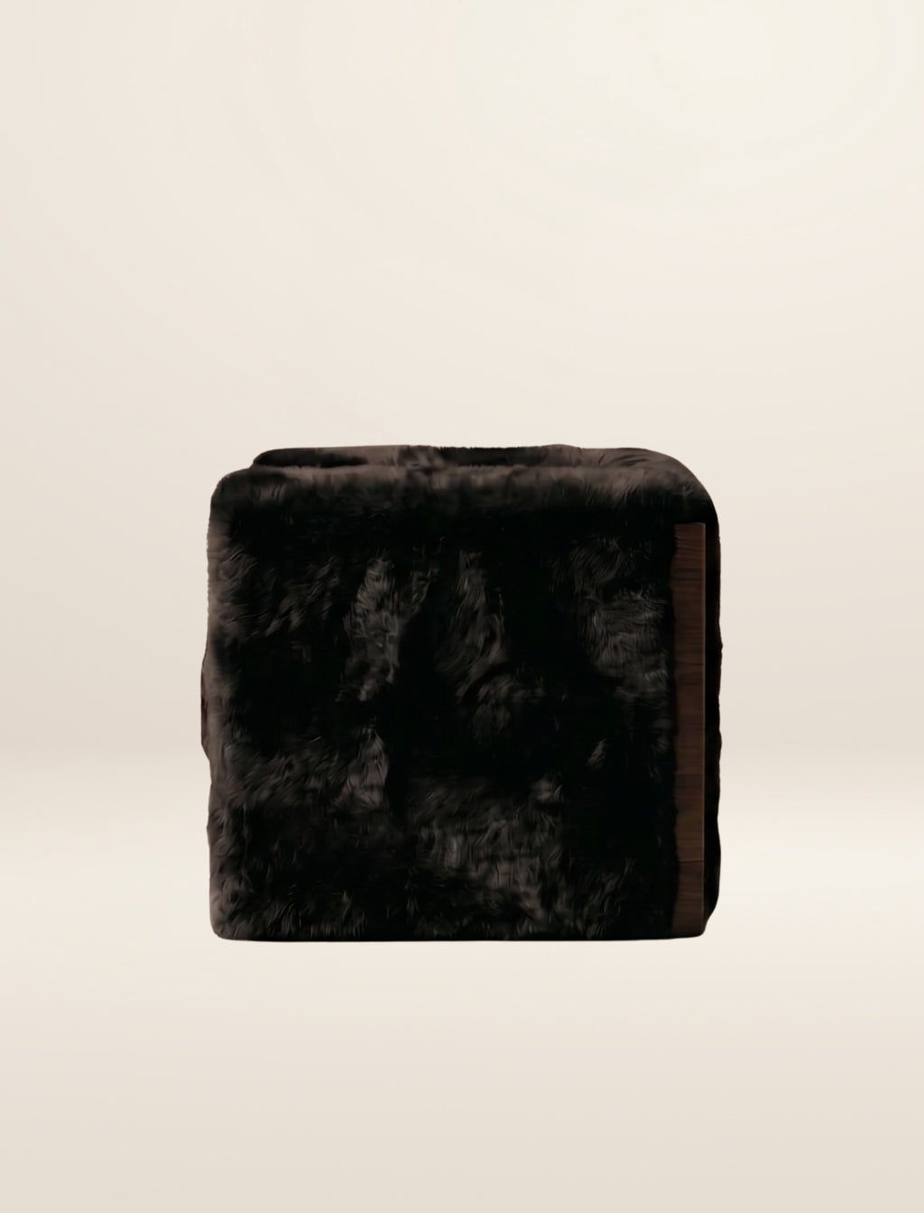 The SOCIALÉ occasional chair, in char shearling on chocolate wood