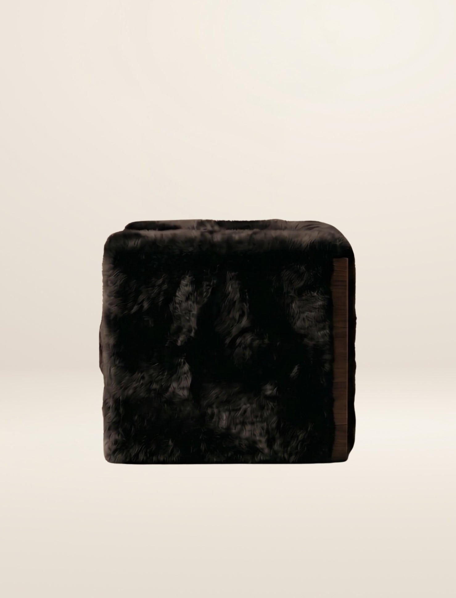 The SOCIALÉ occasional chair, in char shearling on chocolate wood