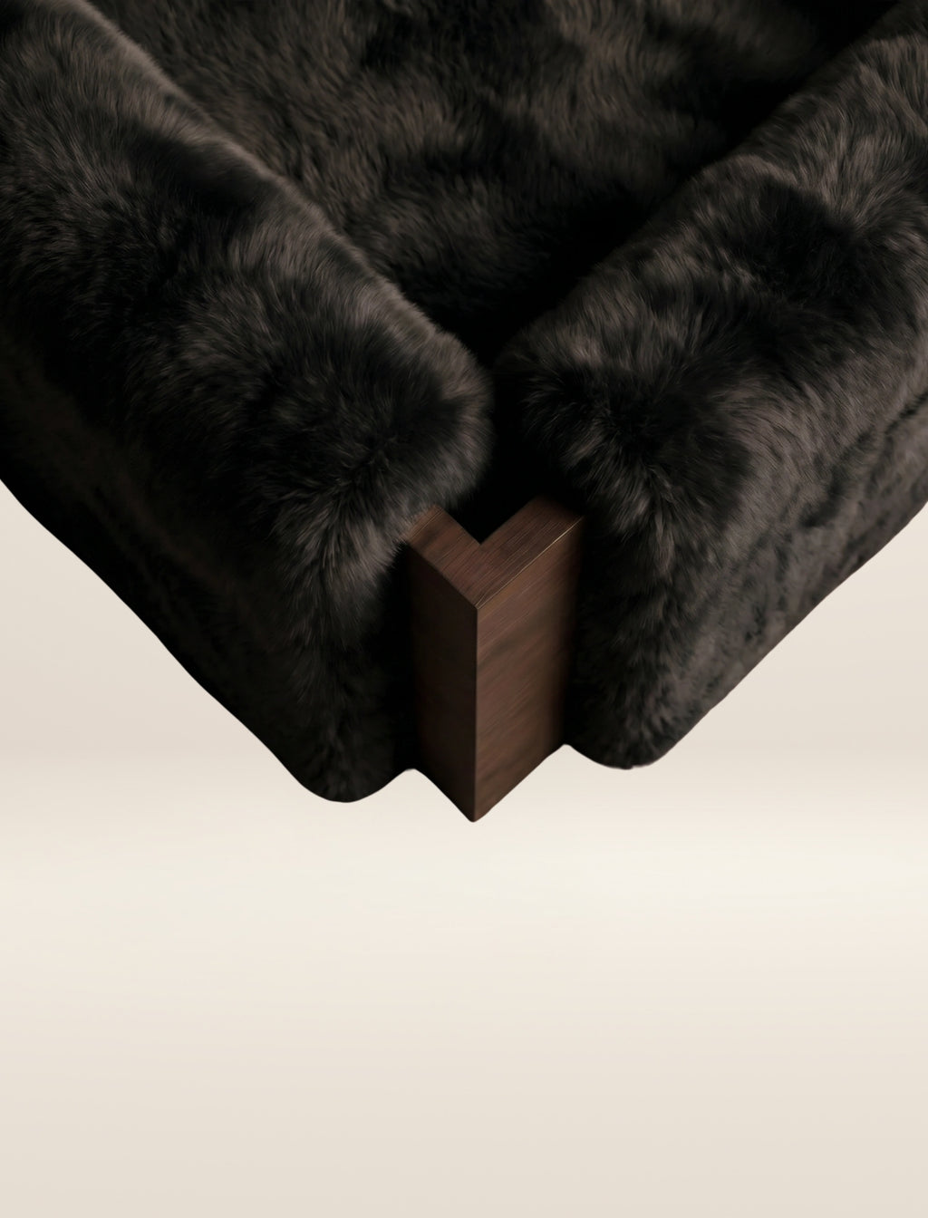 The SOCIALÉ occasional chair, in char shearling on chocolate wood