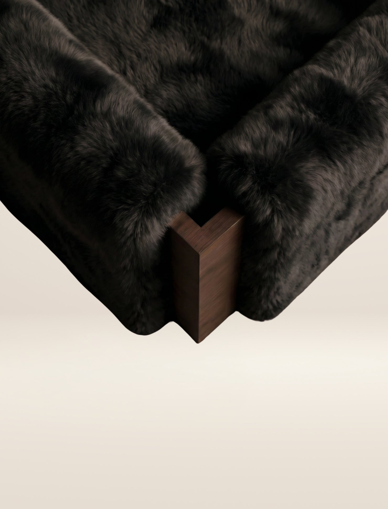 The SOCIALÉ occasional chair, in char shearling on chocolate wood