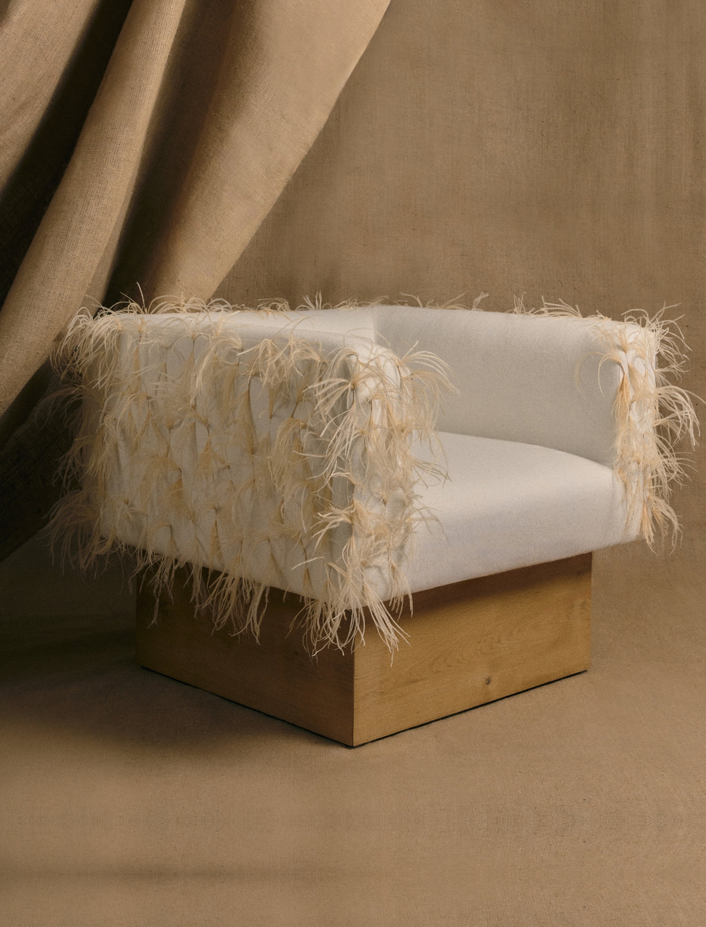 The CLIFTON IN COUTURE feathered armchair
