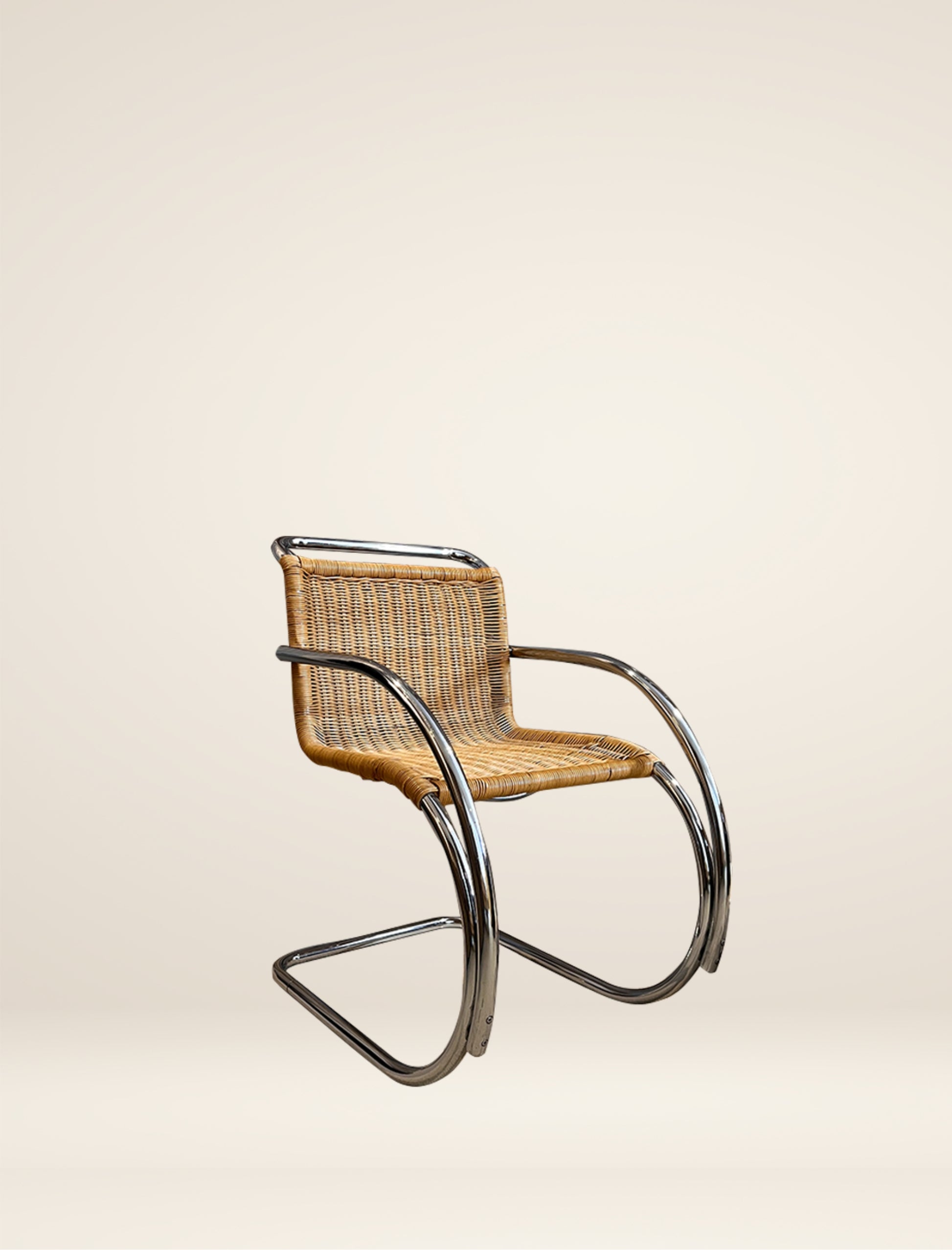 The MR20 chair in rattan and chrome
