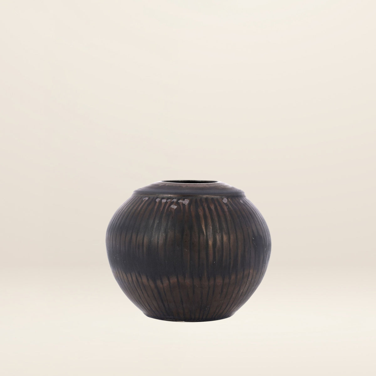 The STRIATED GLOBULAR vase by Thelma Marcuson