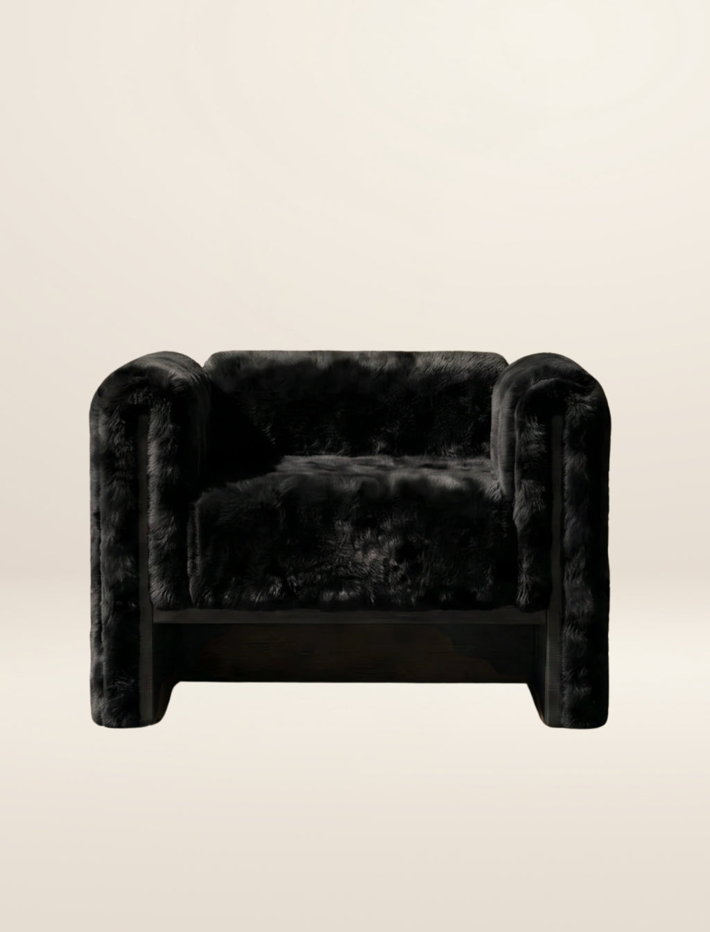 The SOCIALÉ occasional chair, in char shearling on char wood
