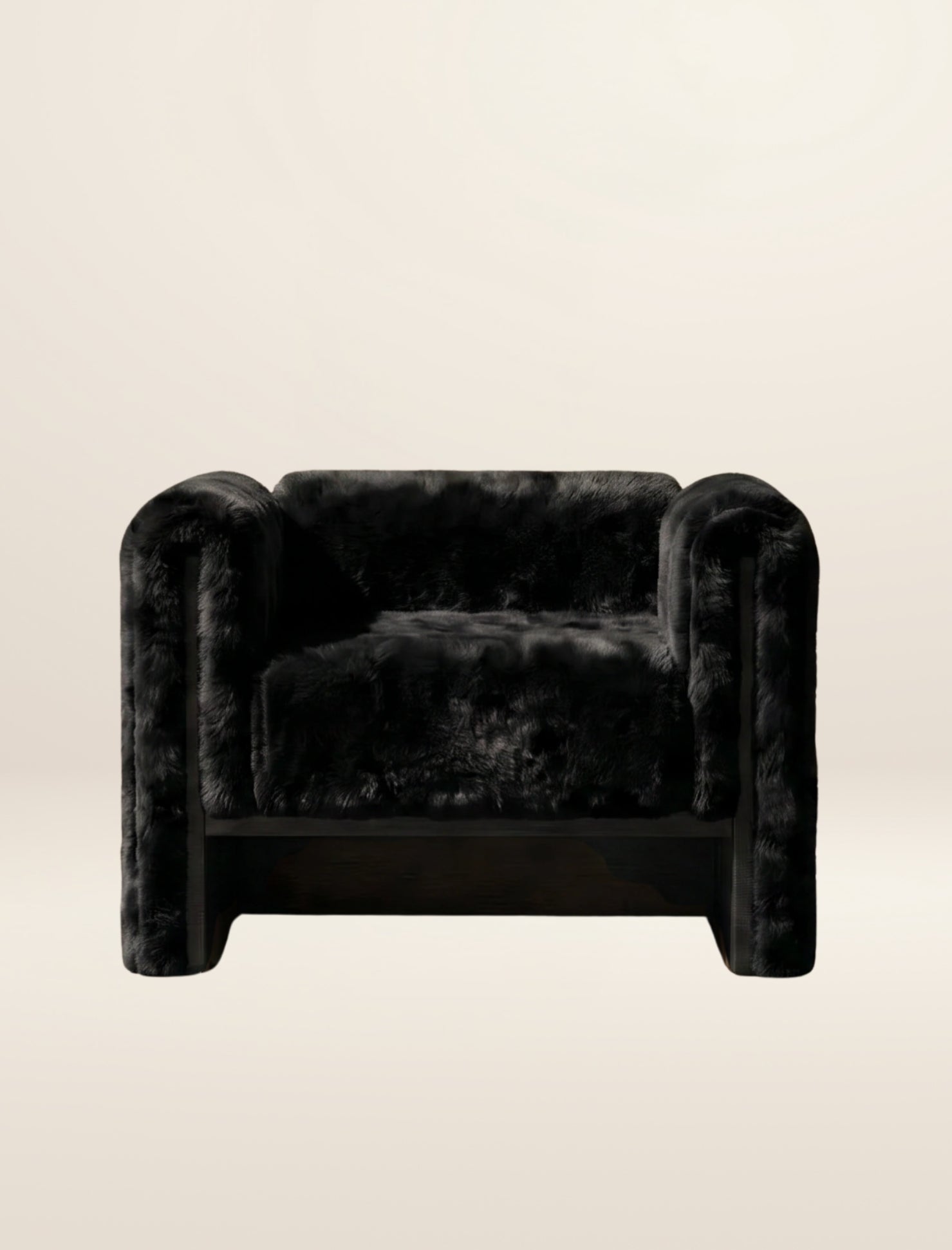 The SOCIALÉ occasional chair, in char shearling on char wood