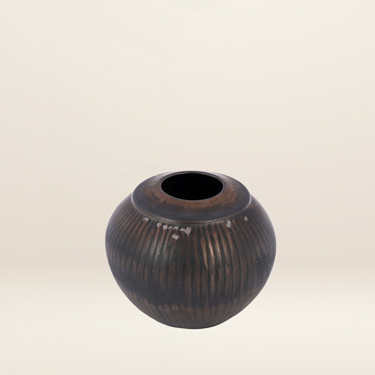 The STRIATED GLOBULAR vase by Thelma Marcuson