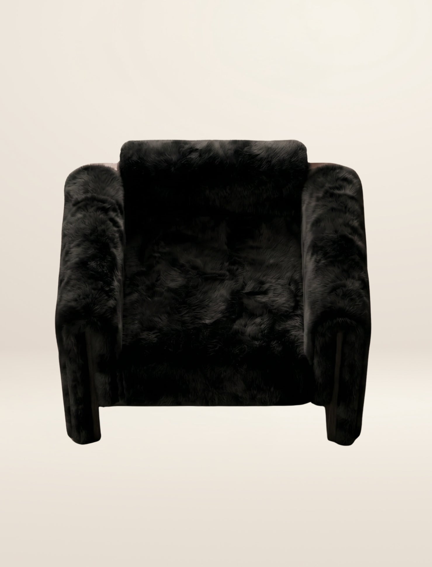 The SOCIALÉ occasional chair, in char shearling on char wood