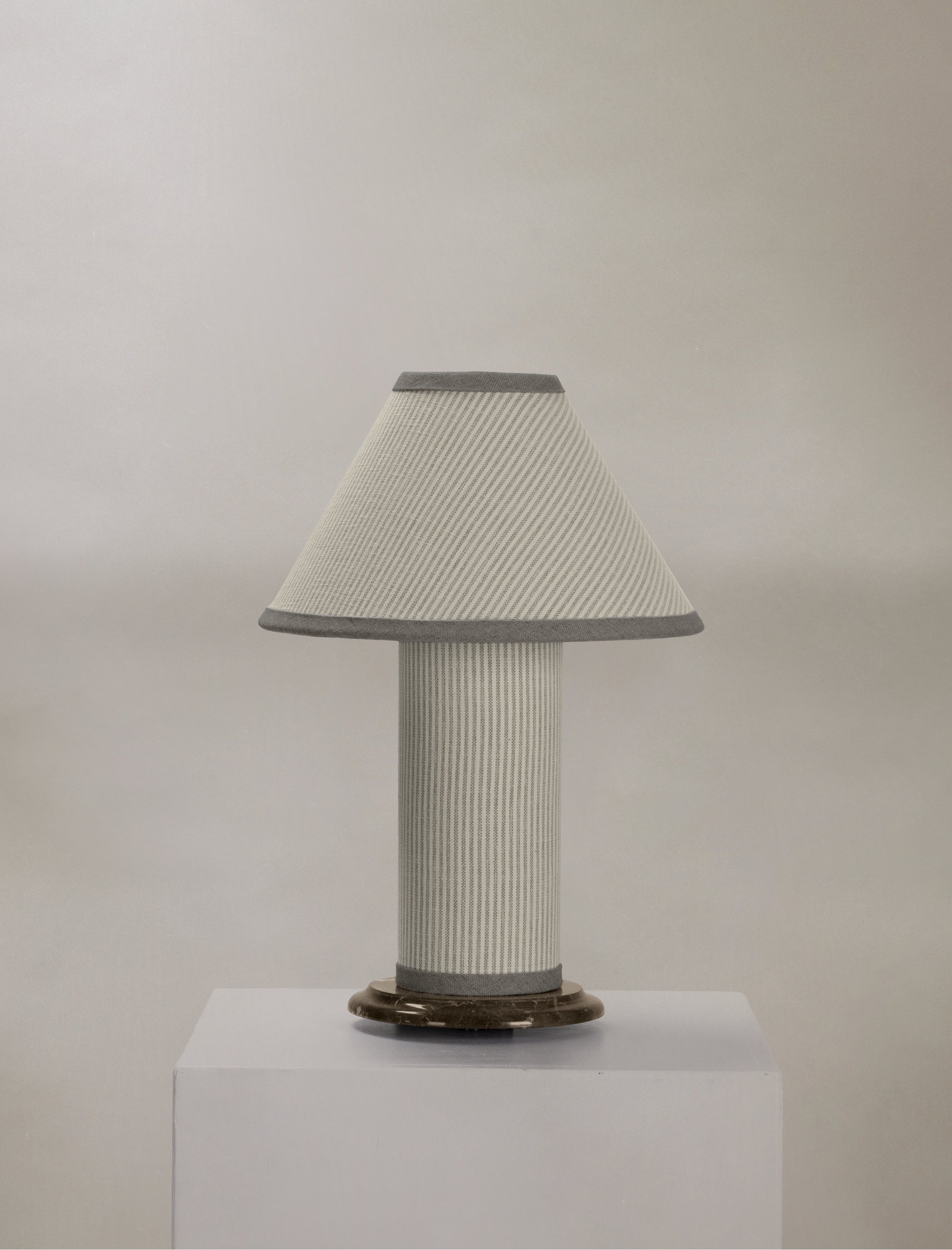 The little COLUMN table lamp in striped linen