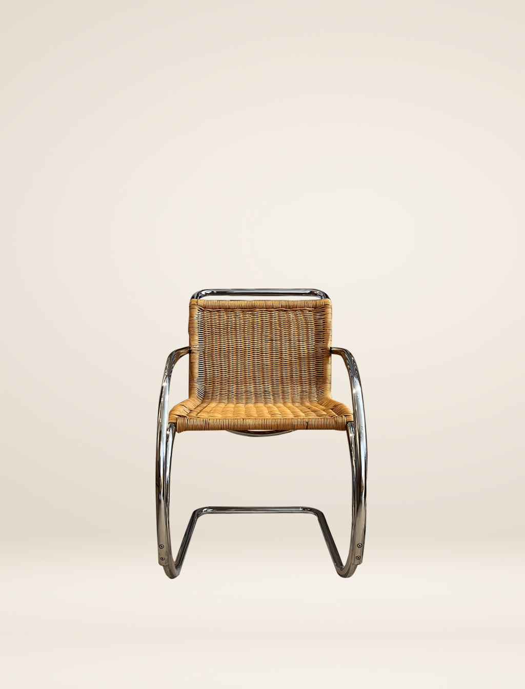 The MR20 chair in rattan and chrome