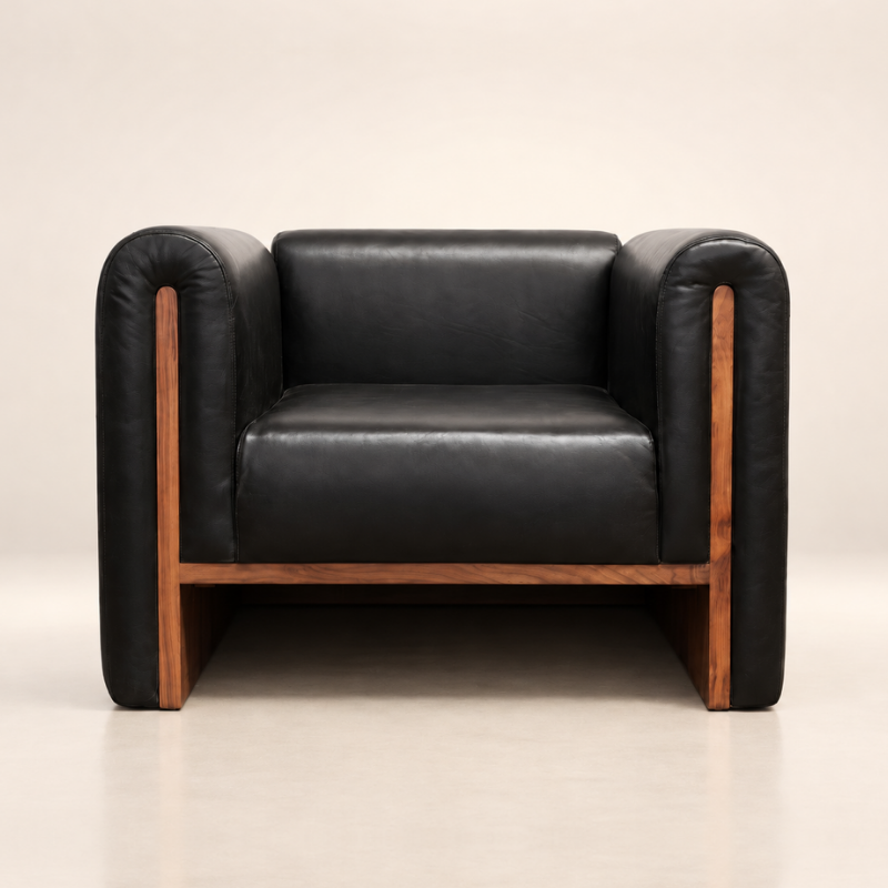 The SOCIALÉ occasional chair, in char leather and tobacco wood