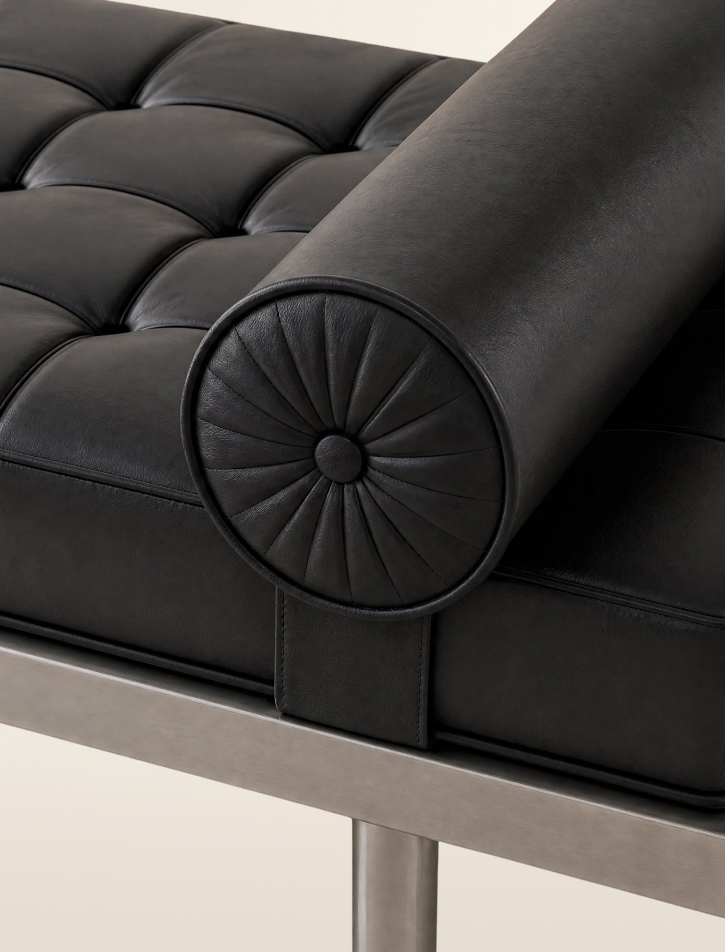 The VERONA day bed in char leather and steel