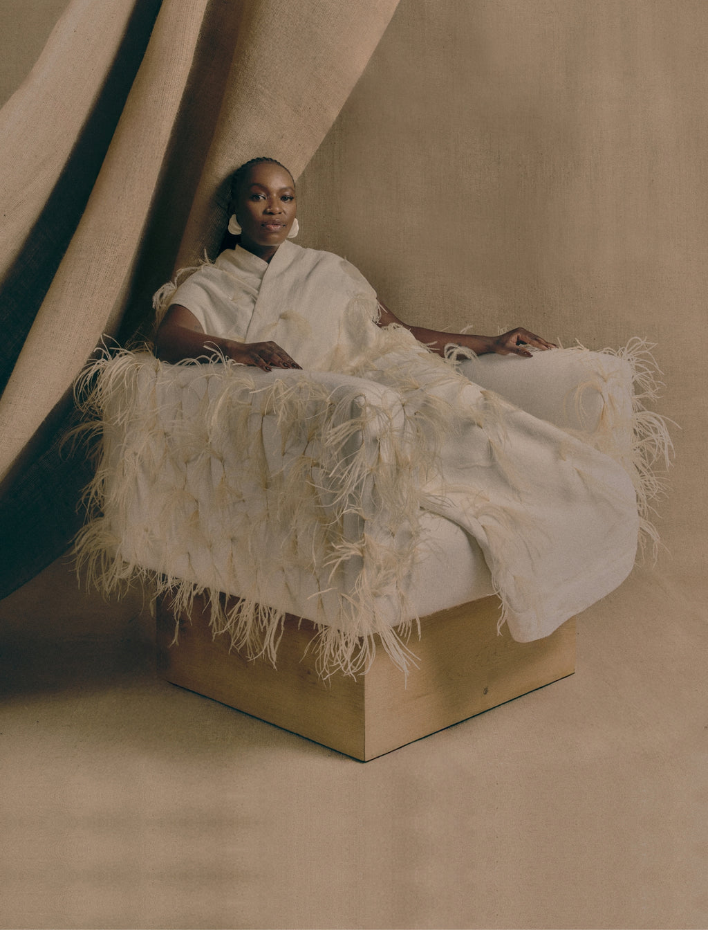 The CLIFTON IN COUTURE feathered armchair