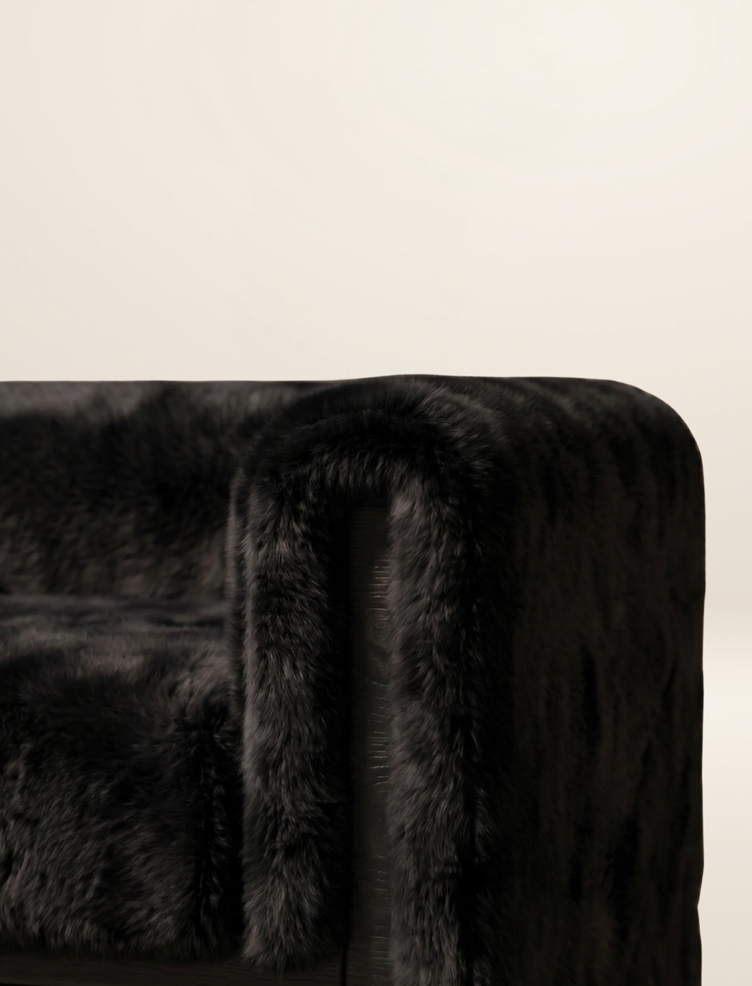 The SOCIALÉ occasional chair, in char shearling on char wood