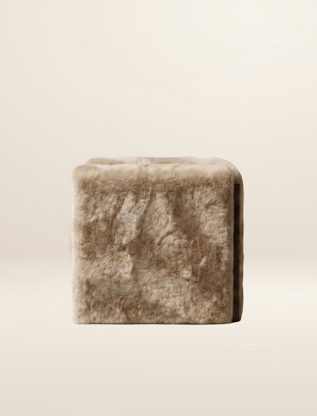 The SOCIALÉ occasional chair, in sand shearling on tobacco wood