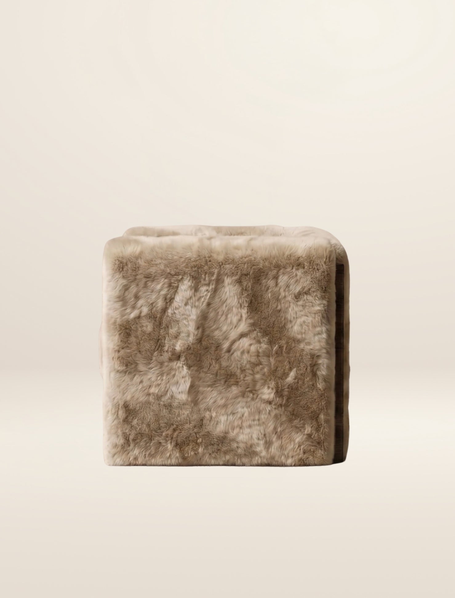The SOCIALÉ occasional chair, in sand shearling on tobacco wood