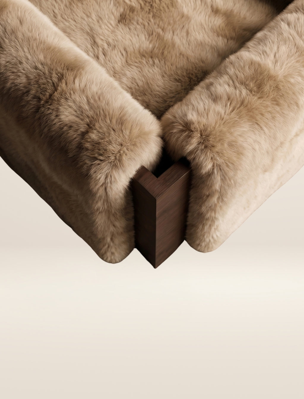The SOCIALÉ occasional chair, in sand shearling on tobacco wood