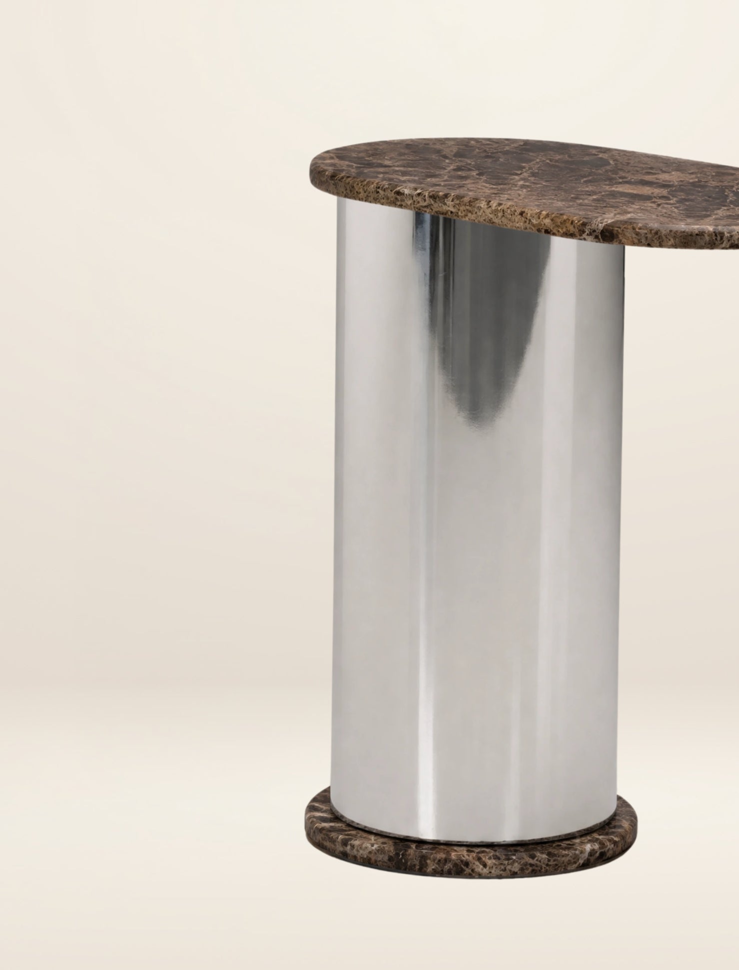 The SOMETHING ON THE SIDE side table in dark emperador