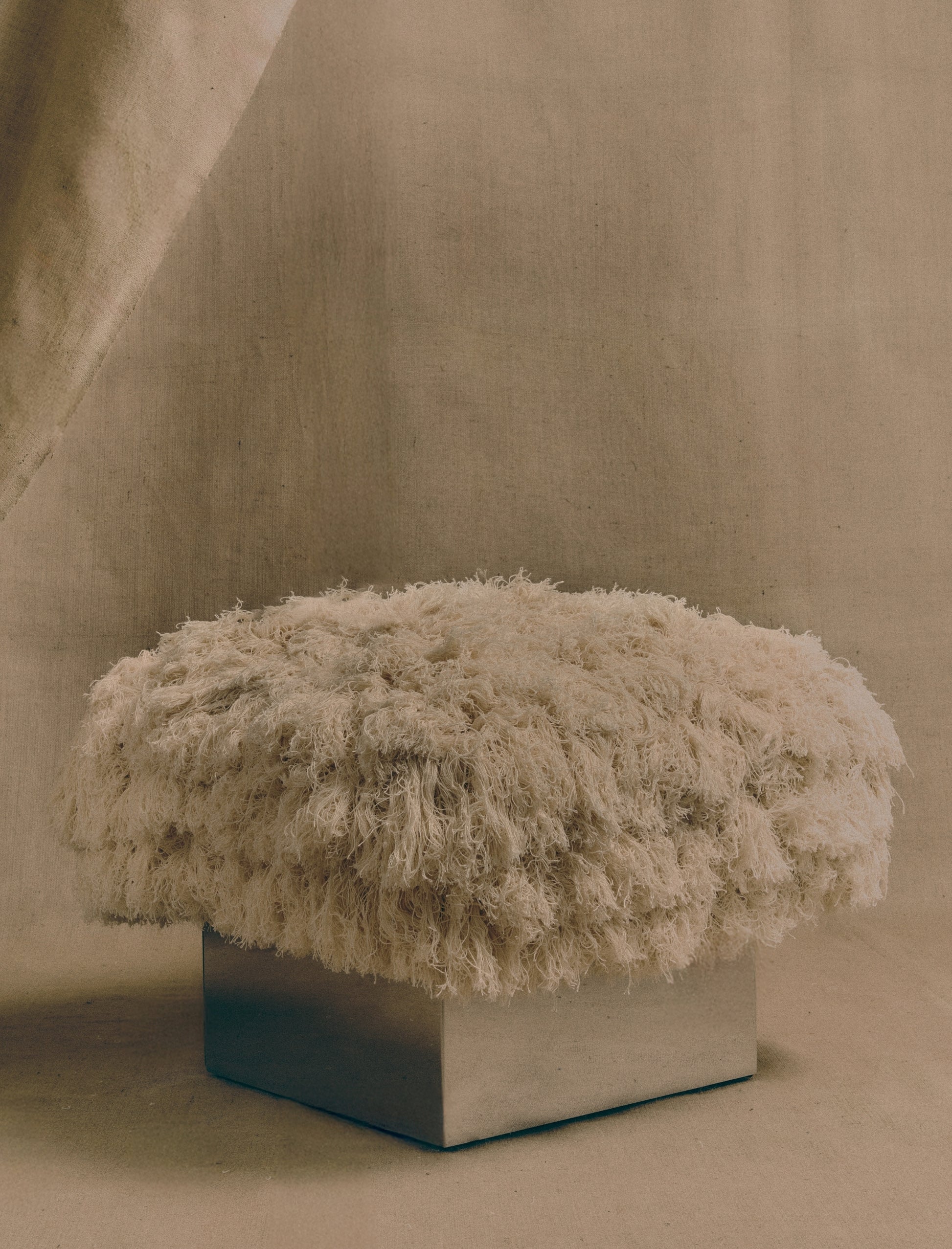 The CLIFTON IN FRAY ottoman