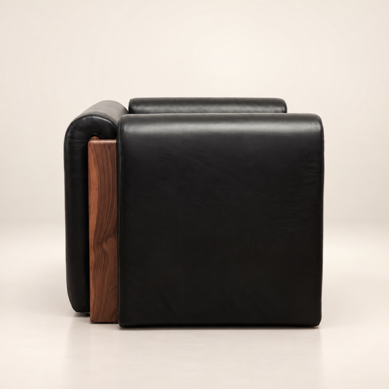 The SOCIALÉ occasional chair, in char leather and tobacco wood