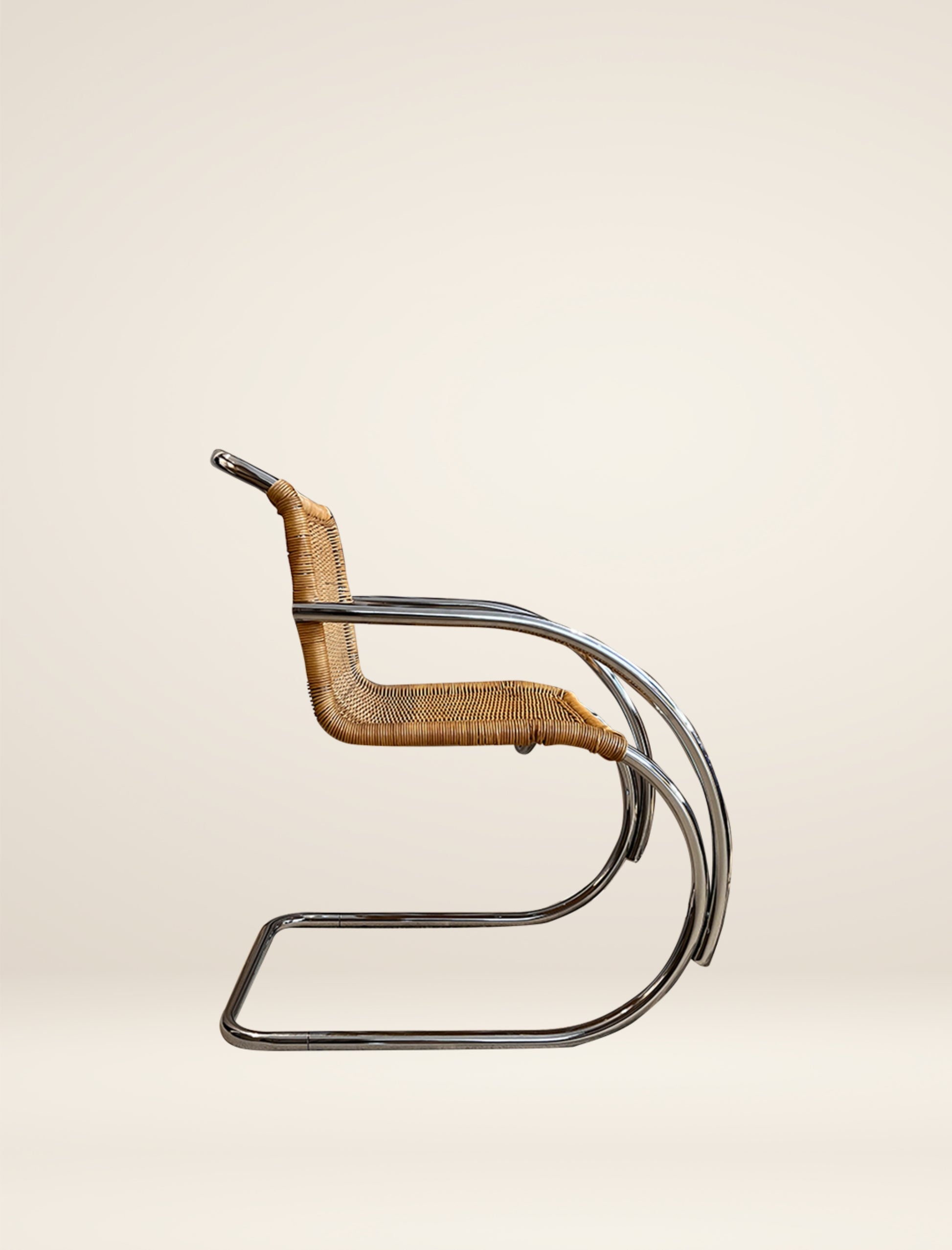 The MR20 chair in rattan and chrome