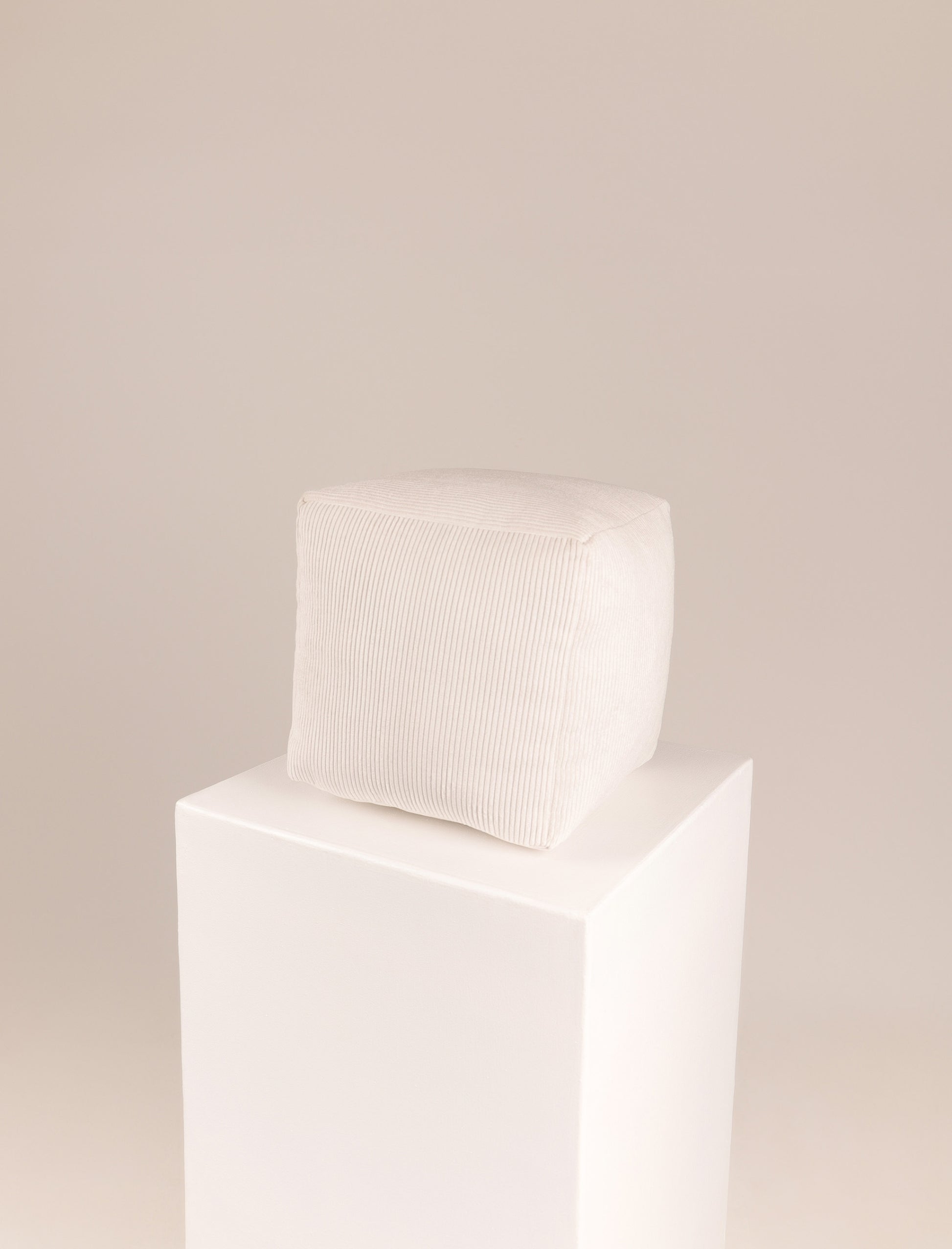 The CUBE scatter in white corduroy
