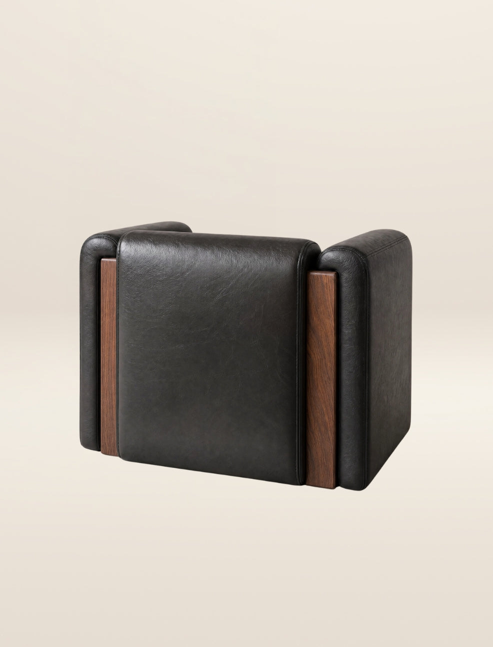The SOCIALÉ occasional chair, in char leather and tobacco wood