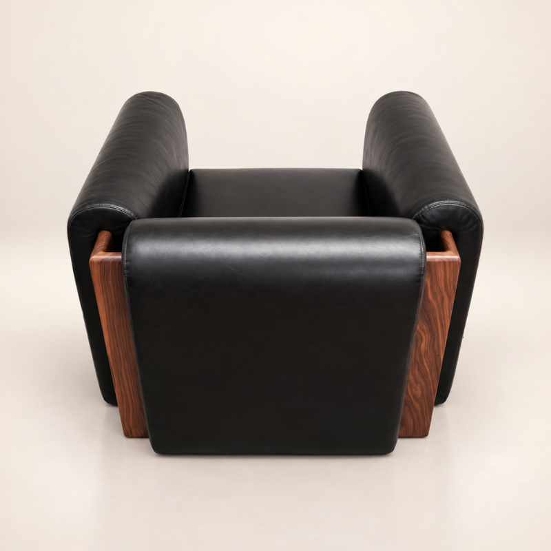 The SOCIALÉ occasional chair, in char leather and tobacco wood
