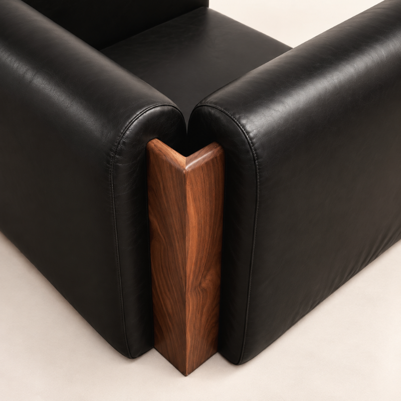 The SOCIALÉ occasional chair, in char leather and tobacco wood