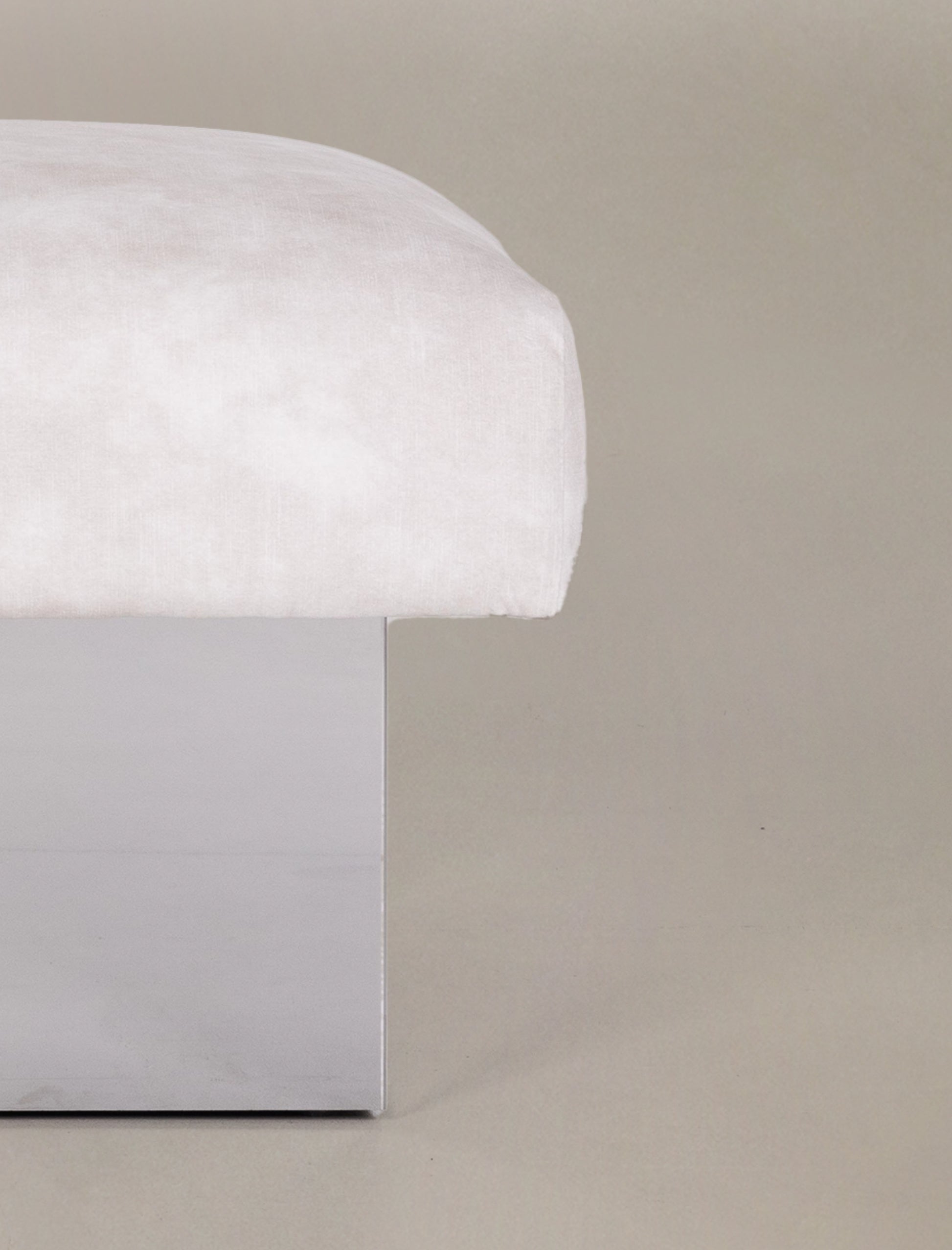 The CLIFTON IN BALANCE ottoman in stainless steel
