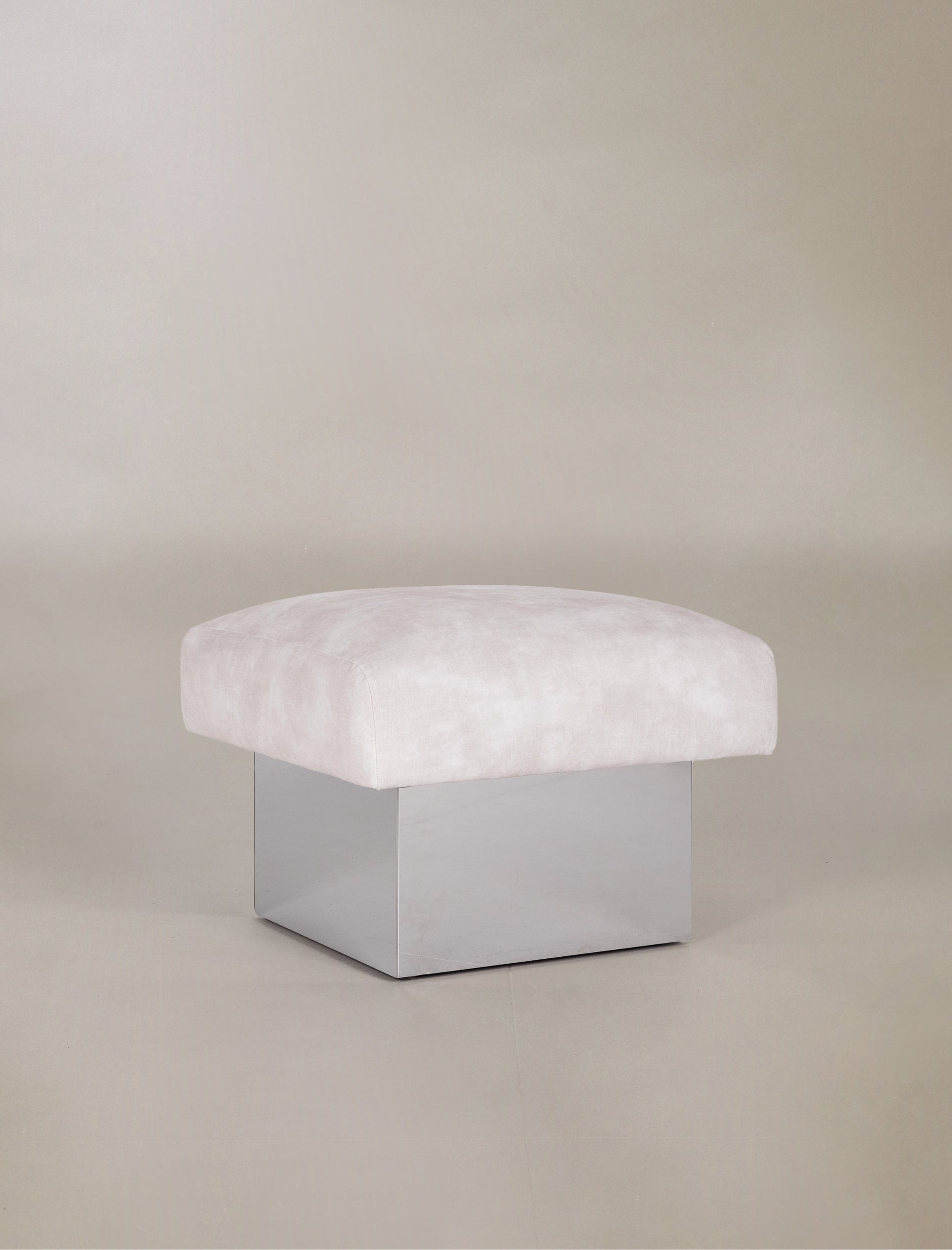 The CLIFTON IN BALANCE ottoman in stainless steel