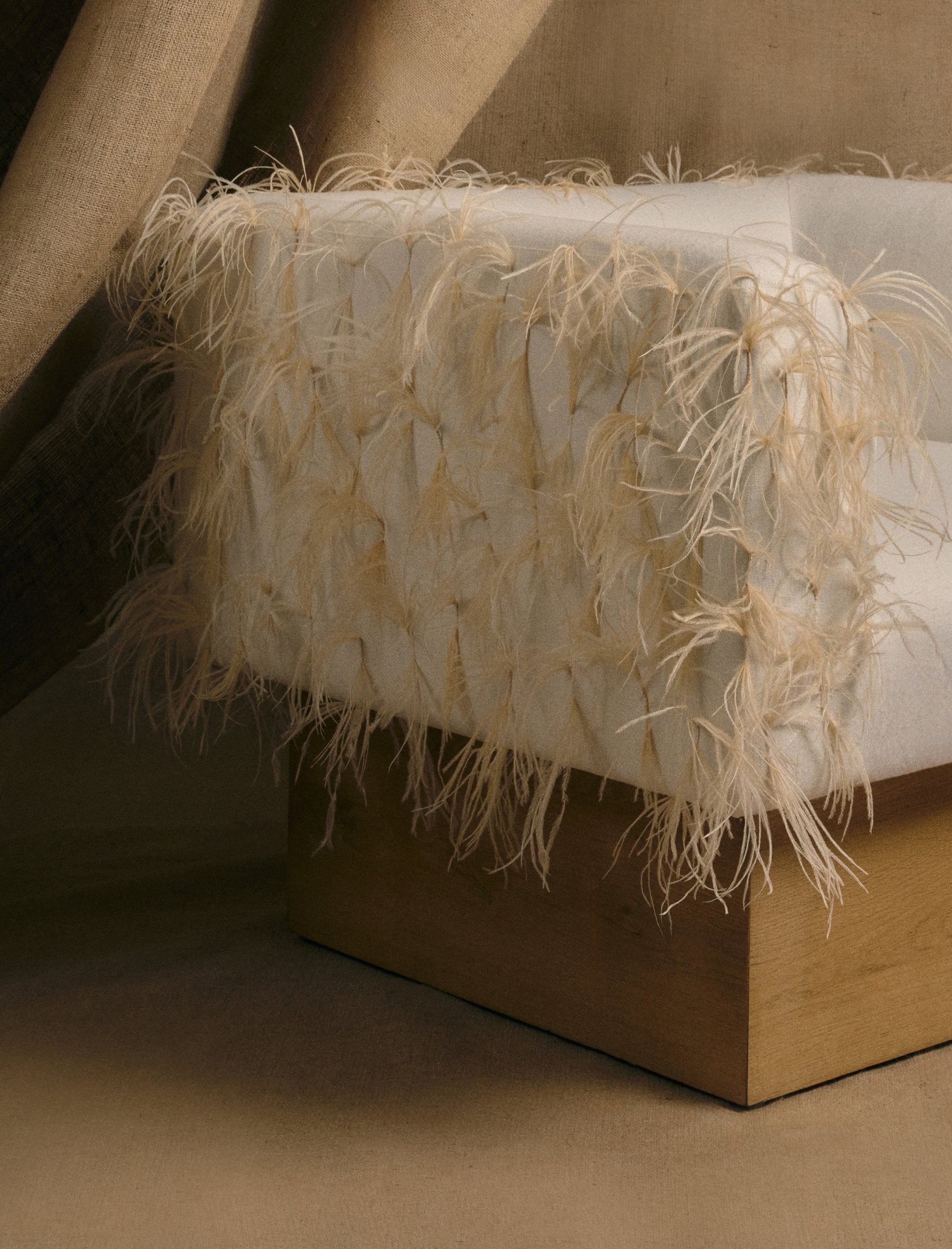 The CLIFTON IN FEATHERS armchair