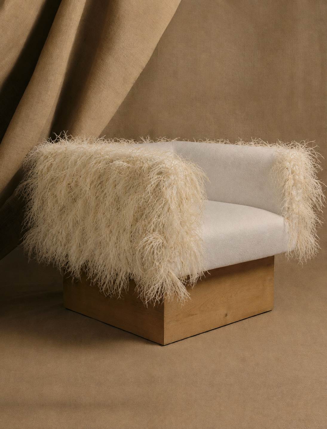 The CLIFTON IN COUTURE feathered armchair